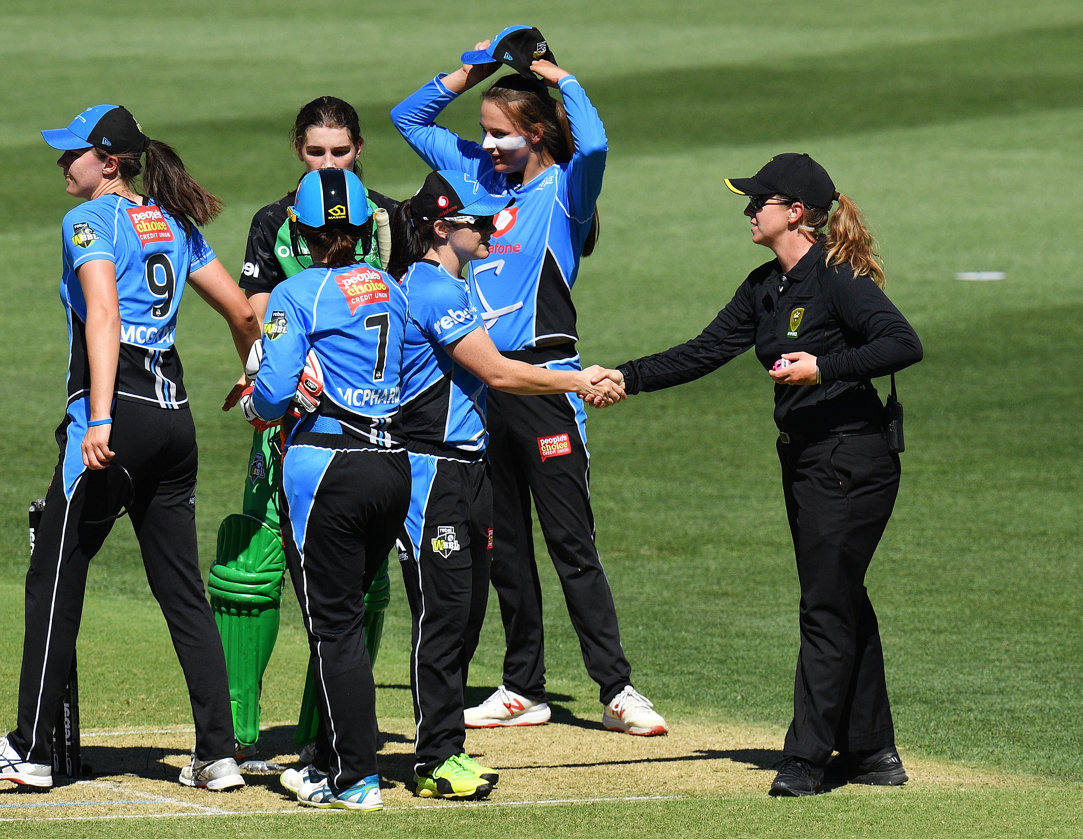 ADELAIDE, VICTORIA - DECEMBER 23: (L-R) Umpire Claire Polosak shakes hands during the Adelaide Strikers v Melbourne Stars Women's Big Bash League Match at Adelaide Oval on December 23, 2018 in Adelaide, Australia. (Photo by Daniel Kalisz/Getty Images)